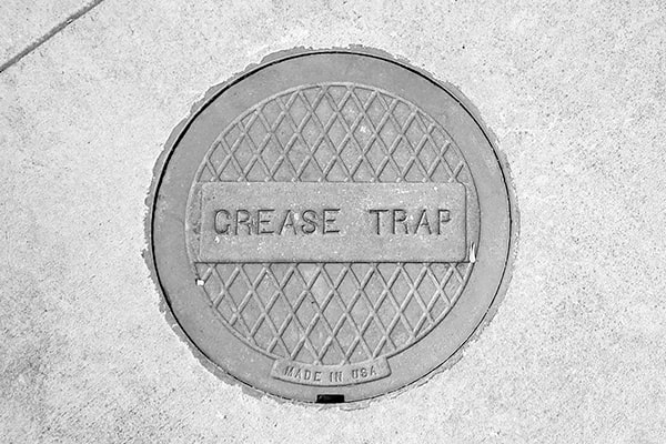 many local health departments mandate regular grease trap pumping for commercial kitchens to maintain hygiene and safety standards